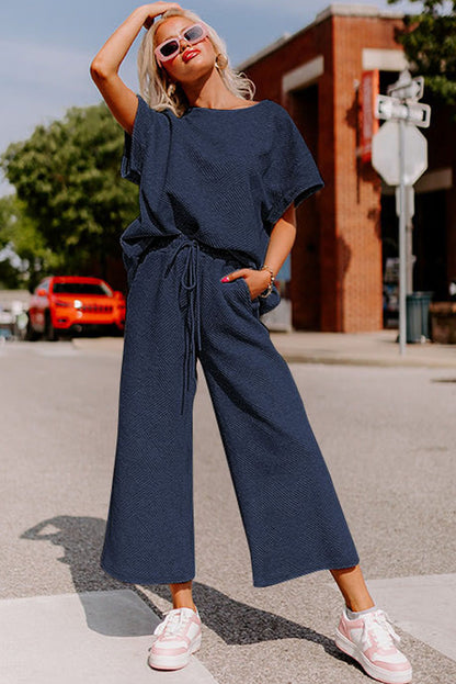 Conjunto de camiseta holgada con textura negra y pantalón con cordón